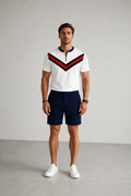 Men's two-piece set featuring a short-sleeved, half-zip polo top with a small stand-up collar and printed pattern, paired with shorts.