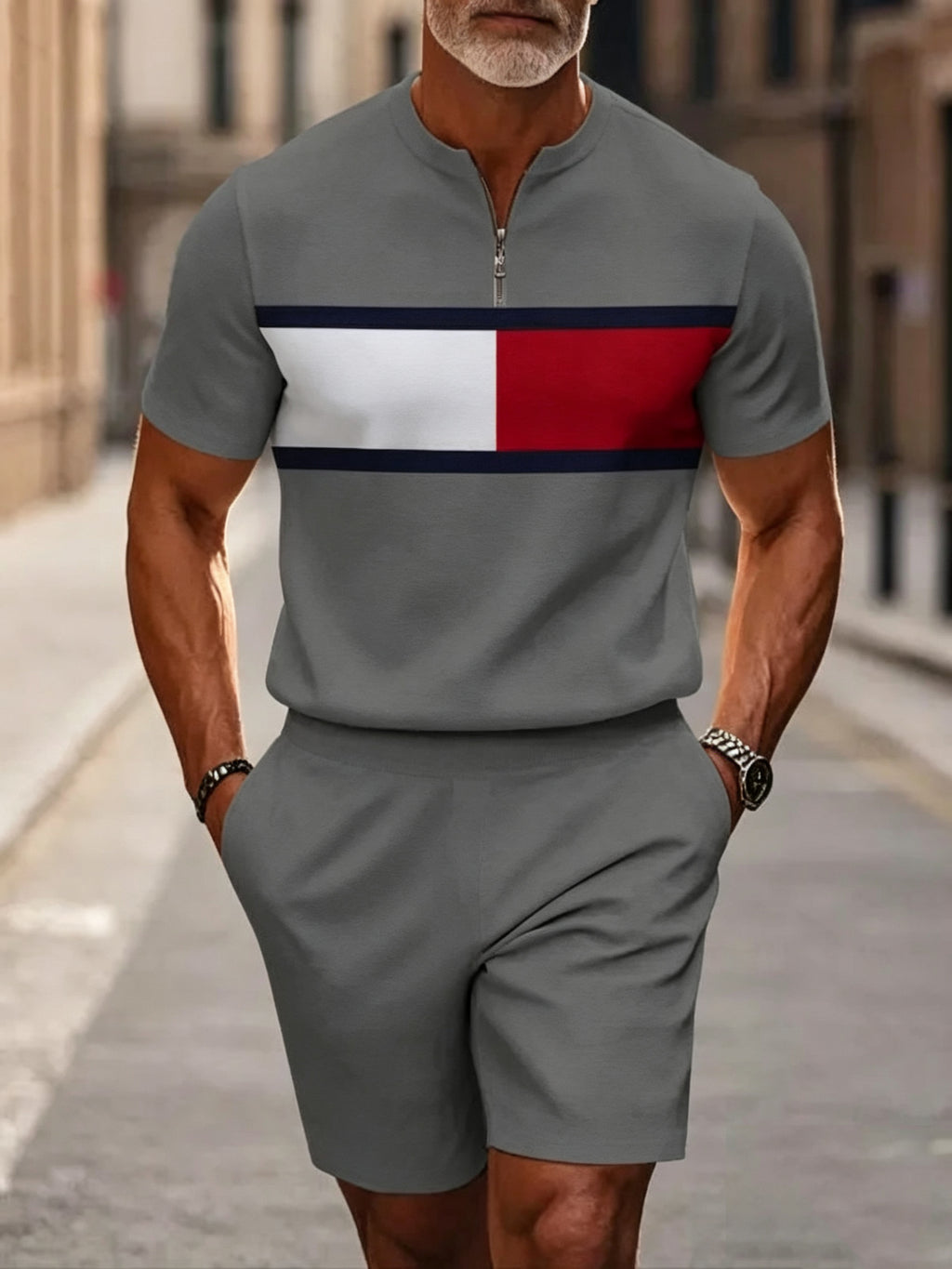 Men's two-piece set featuring a short-sleeved, half-zip polo top with a small stand-up collar and printed pattern, paired with shorts.