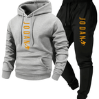 Men's two-piece set with hooded top and graphic print—an essential casual choice for autumn and winter.
